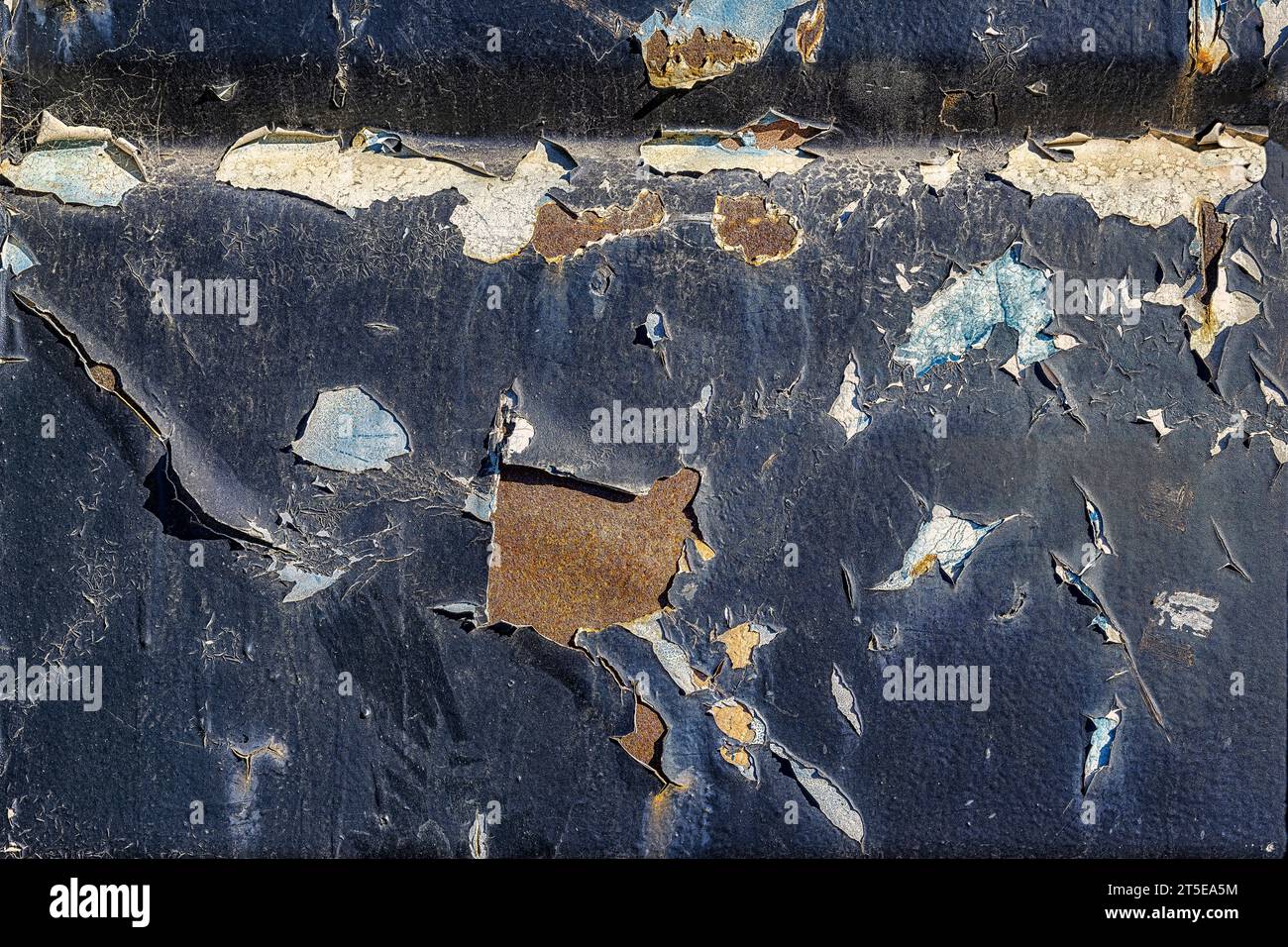 Peeling old blue paint with rust. Abstract background pattern Stock Photo