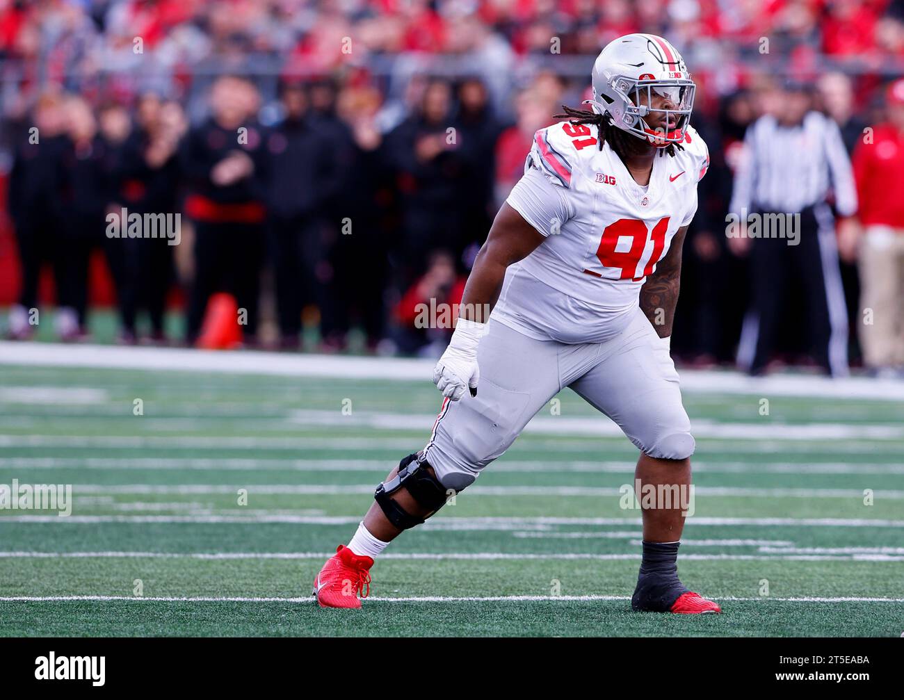 Ohio State defensive tackle Tyleik Williams (91) lines up against ...