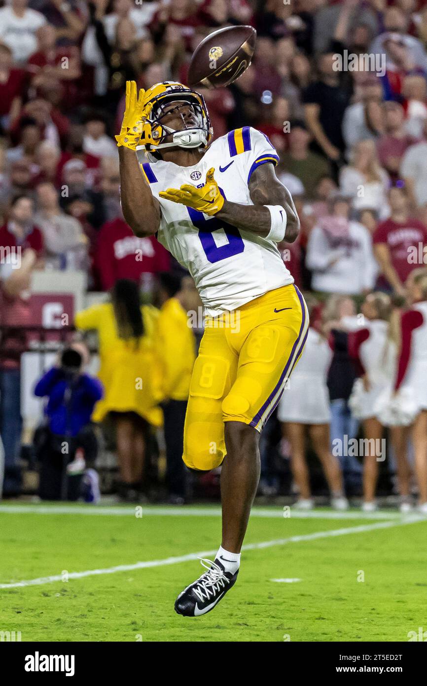 LSU wide receiver Malik Nabers catches a pass and scores a touchdown