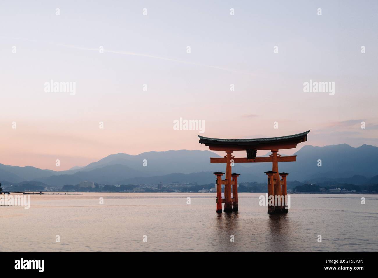 The Itsukushima Jinja Otorii (Grand Torii Gate) at sunset, Miyajima Island, Hiroshima, Japan Stock Photo