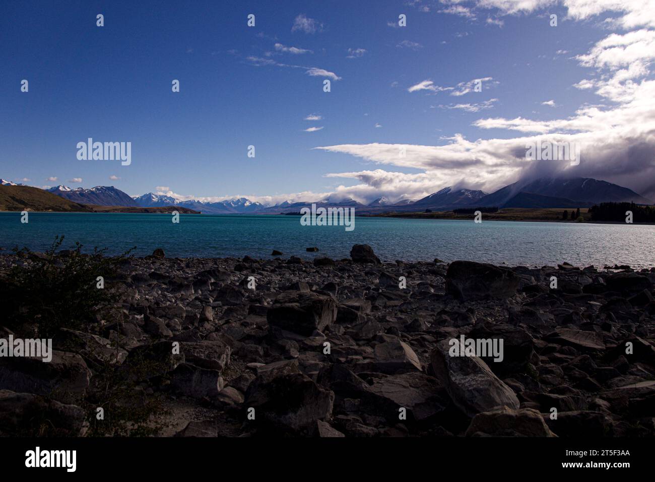 Shoreline view  of Lake Tekapo New Zealand Stock Photo