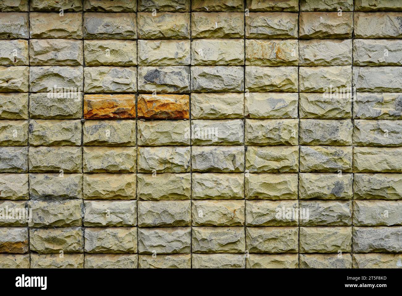 Wall background made of natural stone Stock Photo - Alamy