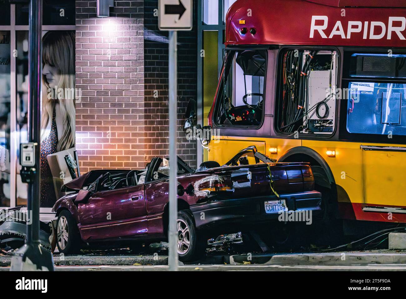A red sedan southbound on 5th Avenue when it collided with a bus ...