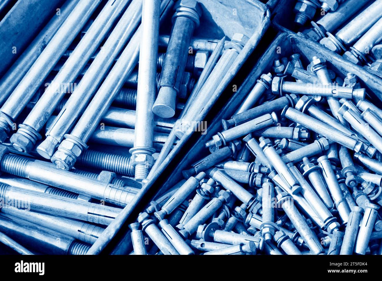 piles of expansion bolts in the iron box Stock Photo Alamy