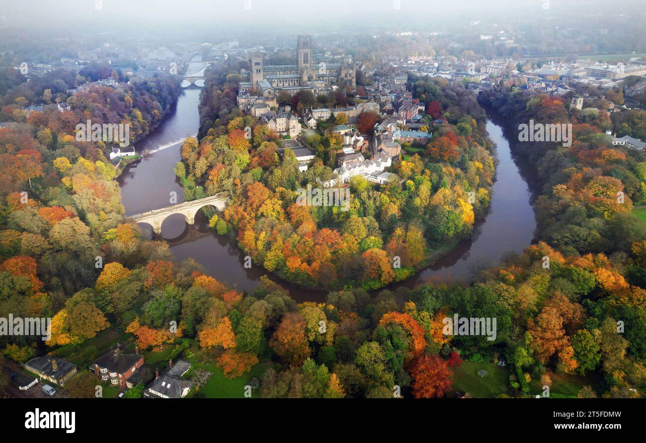 RETRANSMITTING CORRECTING DATE TO 4TH NOVEMBER Autumn colours on the trees surrounding Durham Cathedral in Durham. Dozens of flood warnings remain in place across England after days of heavy rain. Forty-three warnings that flooding is likely remained in place on Sunday morning along with 170 more warnings that flooding is possible, the Environment Agency said. Picture date: Saturday November 4, 2023. Stock Photo