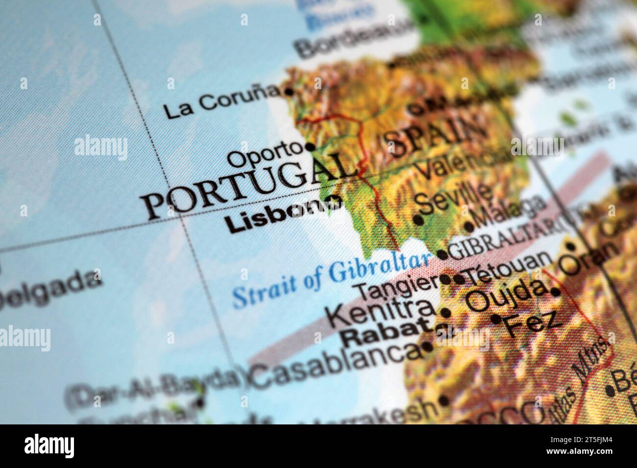Lisbon Portugal on a world globe. Deliberate Shallow depth of field Stock Photo