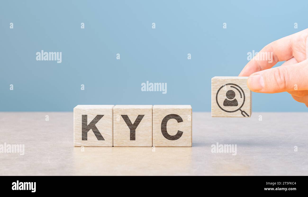 KYC Know Your Customer on wooden cubes. Business verifying identity of clients. Business verifying the identity of your client concept. Financial clie Stock Photo