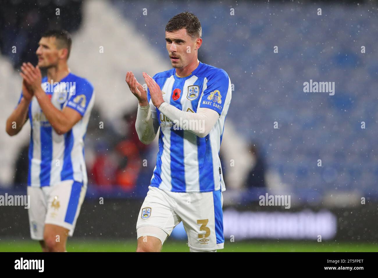 Josh Ruffels of Huddersfield Town applauds the home fans during the Sky ...