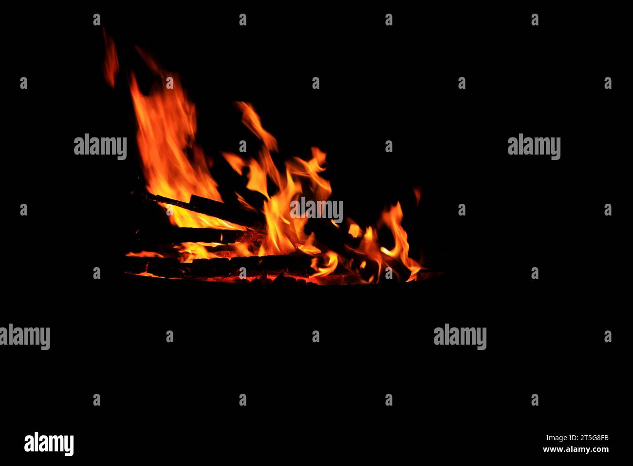 flame burning in the night, closeup of photo Stock Photo - Alamy