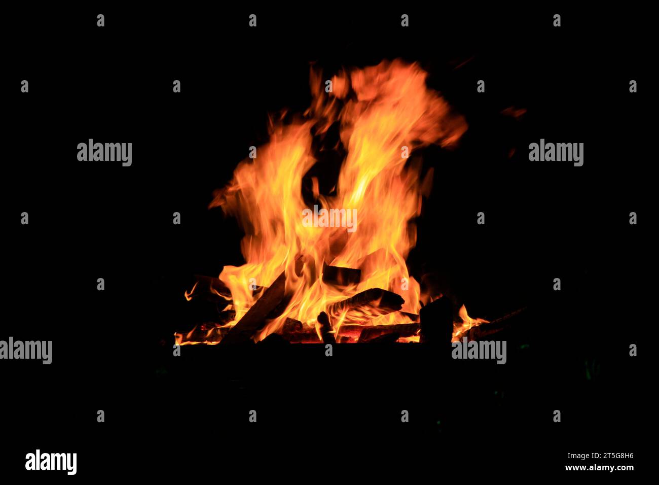 flame burning in the night, closeup of photo Stock Photo - Alamy