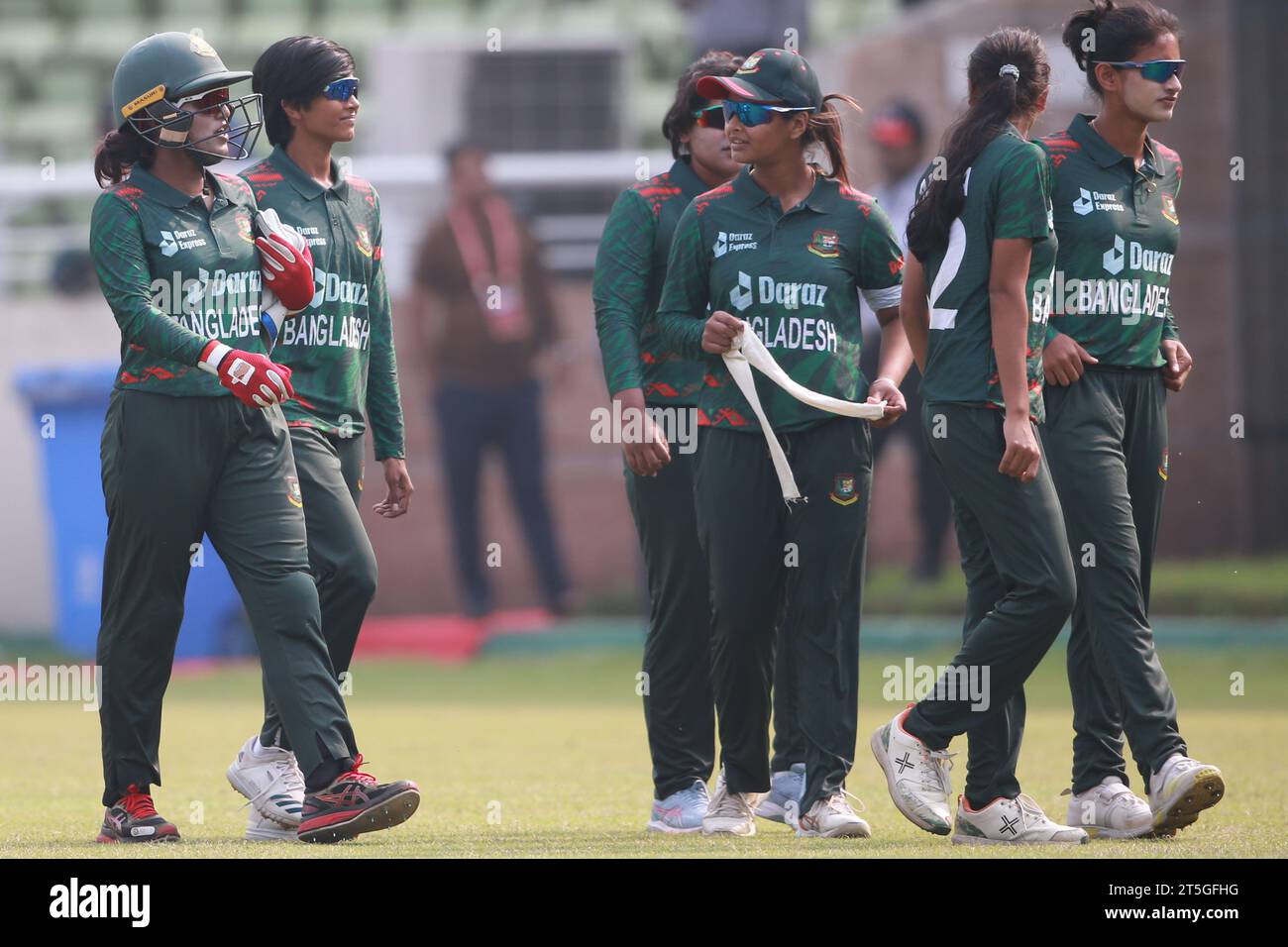 Bangladesh women cricket team Captain Nigar Sultana Joty (L) along teammates walk through as Pakistan women's cricket team competed to a five-wicket w Stock Photo