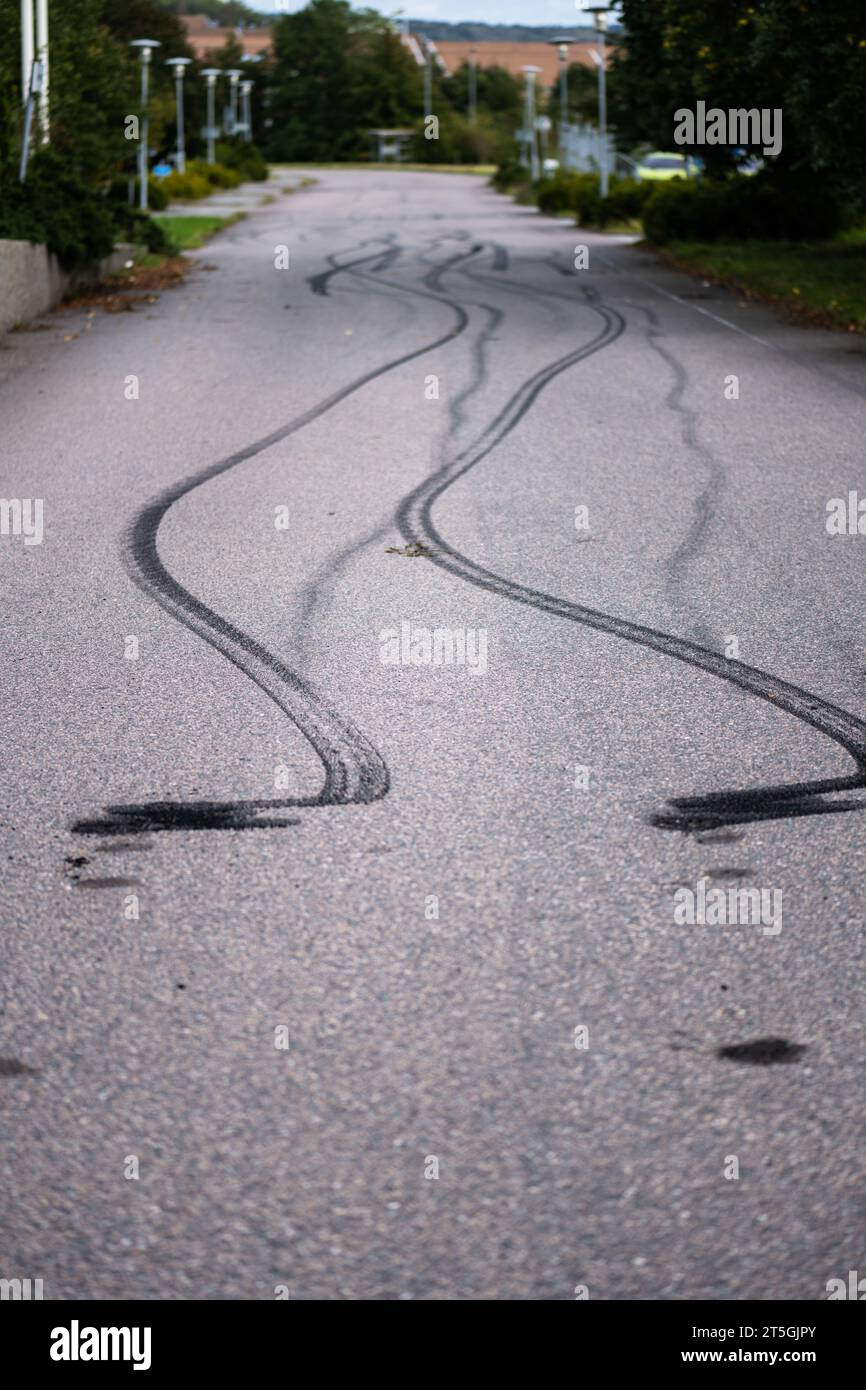 Burnout tire marks on asphalt Stock Photo - Alamy