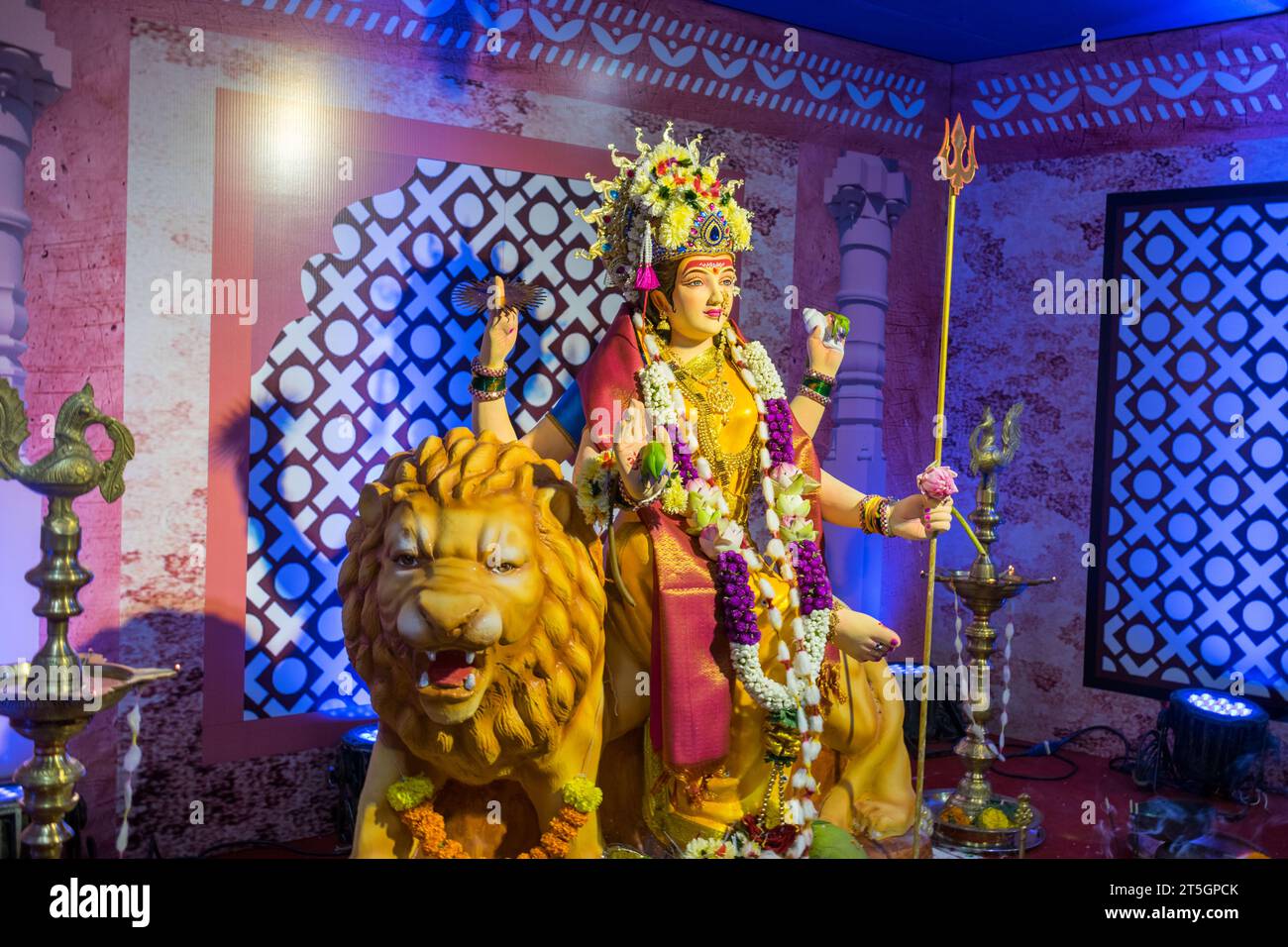 A beautiful idol of Maa Durga being worshipped at a pandal during Navratri in Mumbai, India Stock Photo