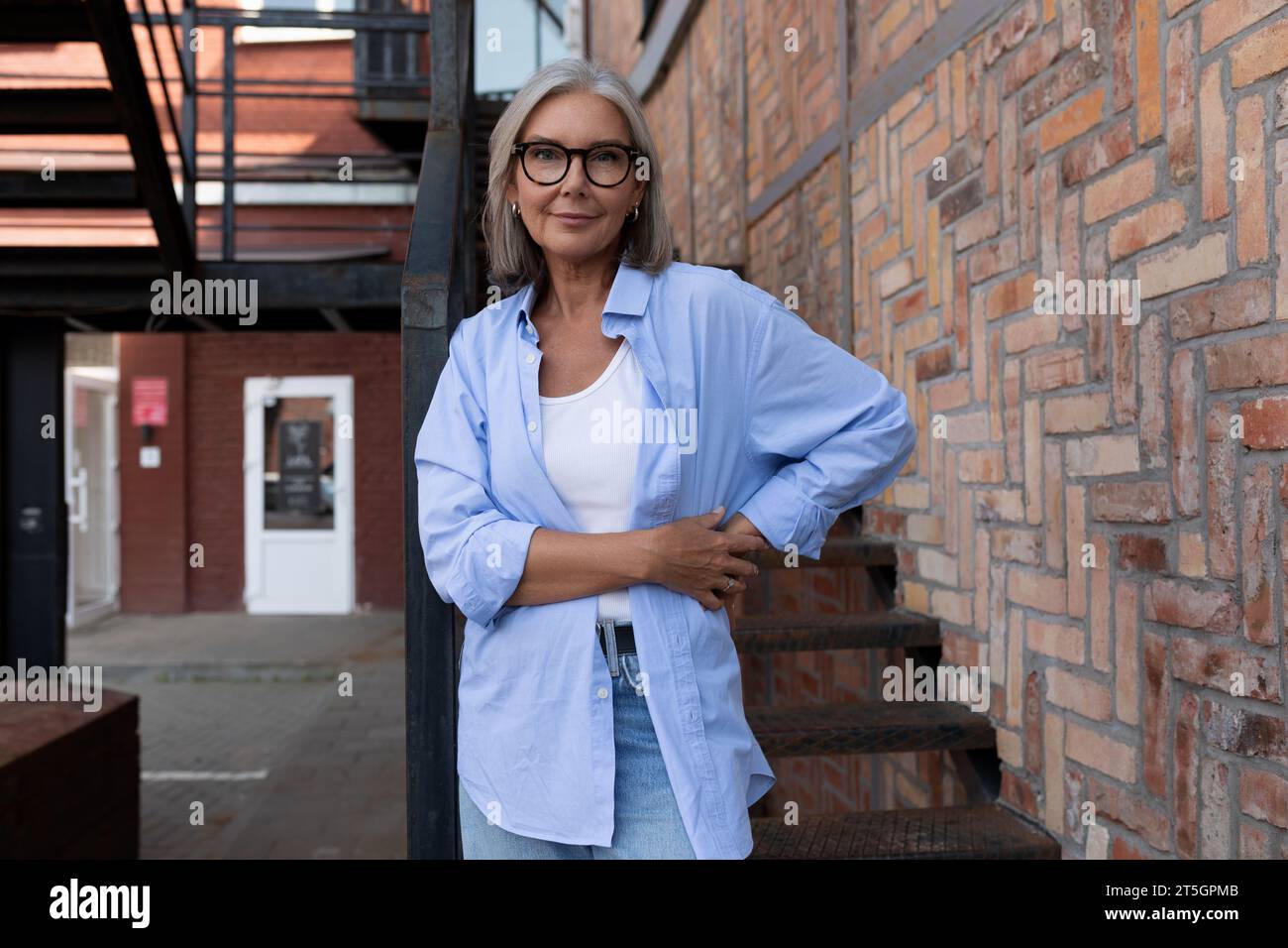 Happy pretty mature woman walks hi-res stock photography and images - Alamy