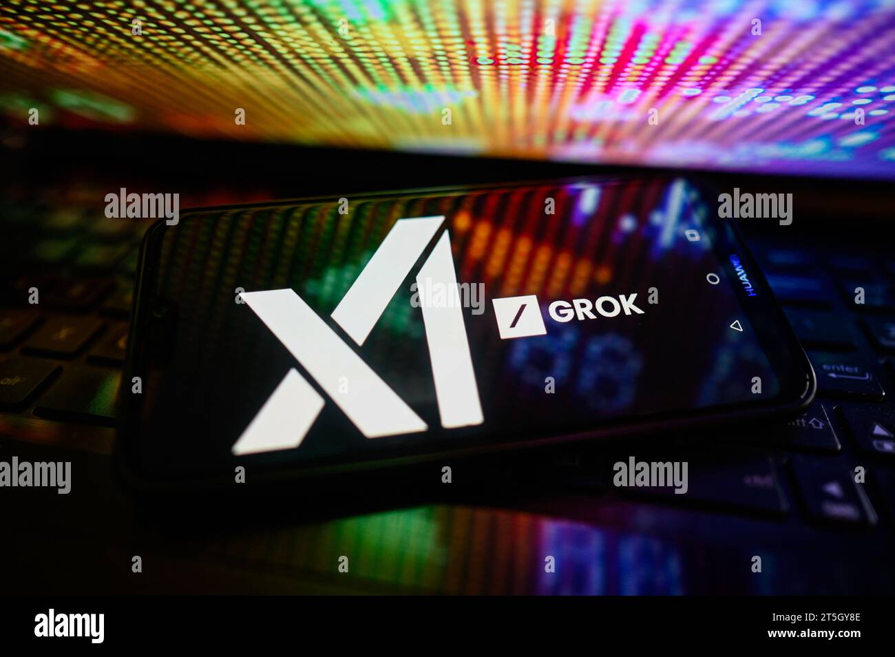 In this photo illustration a Grok by Xai logo is displayed on a