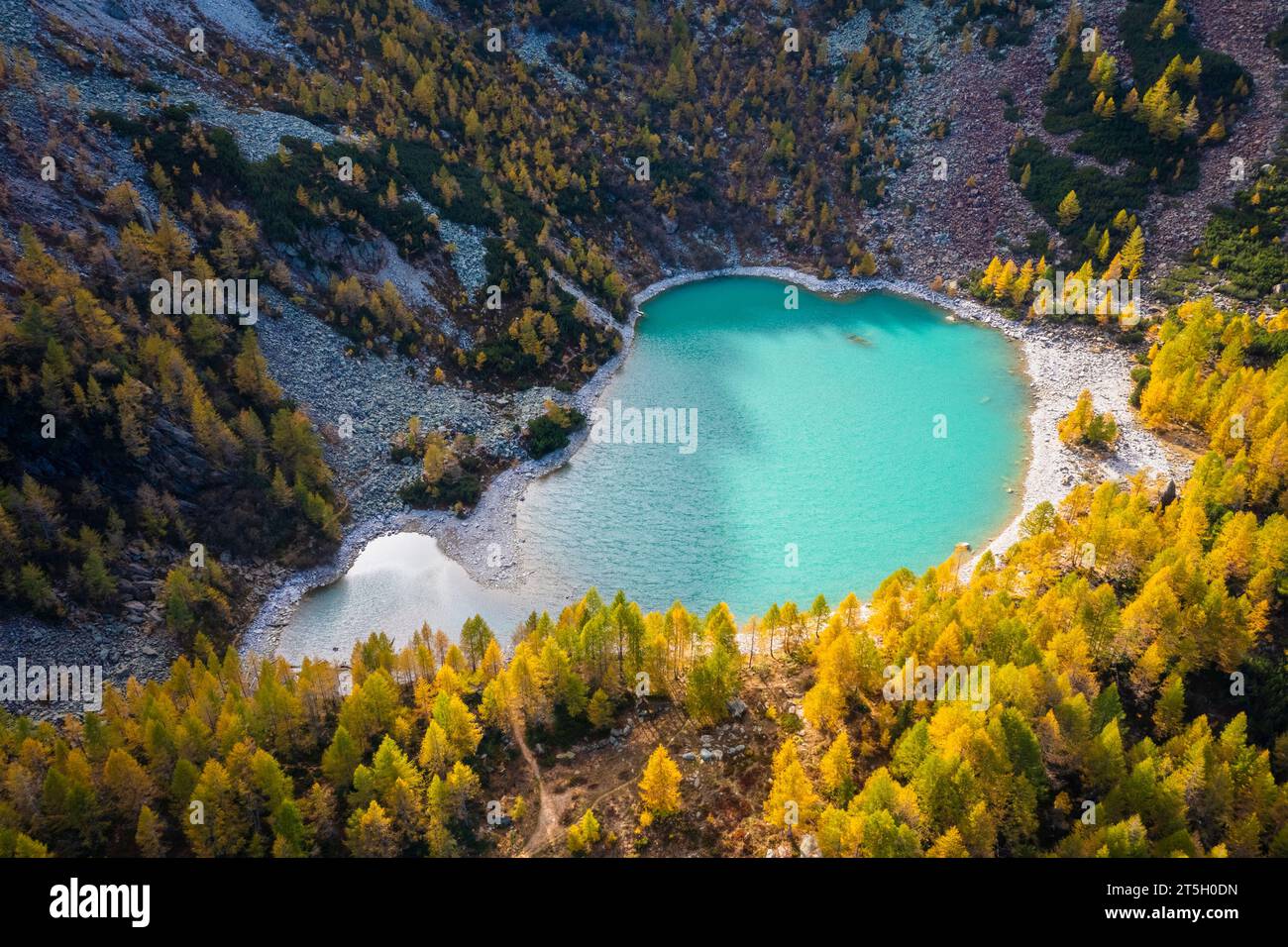 Aerial view of the Lagazzuolo lake in autumn. Valmalenco, Valtellina, Sondrio, Lombardy, Italy, Europe. Stock Photo