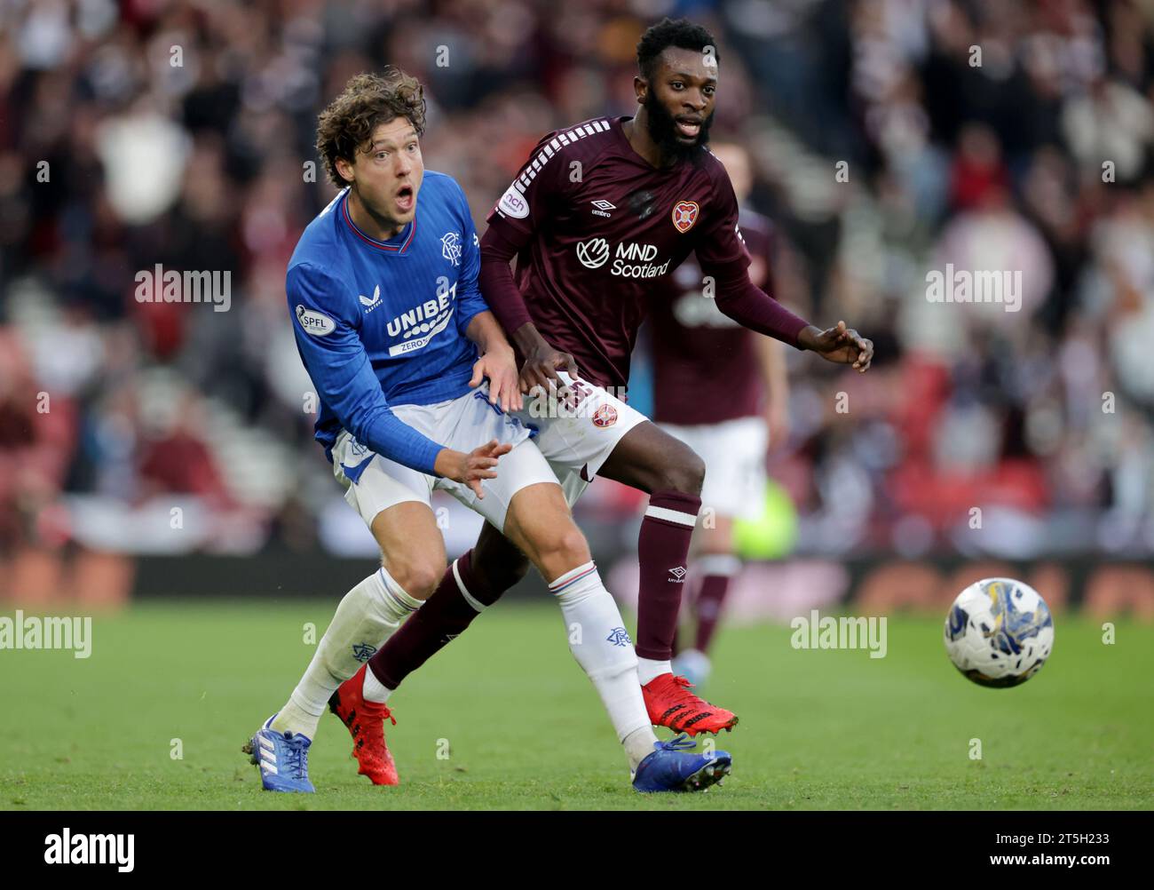 Rangers' Sam Lammers (left) and Heart of Midlothian's Beni Baningime ...