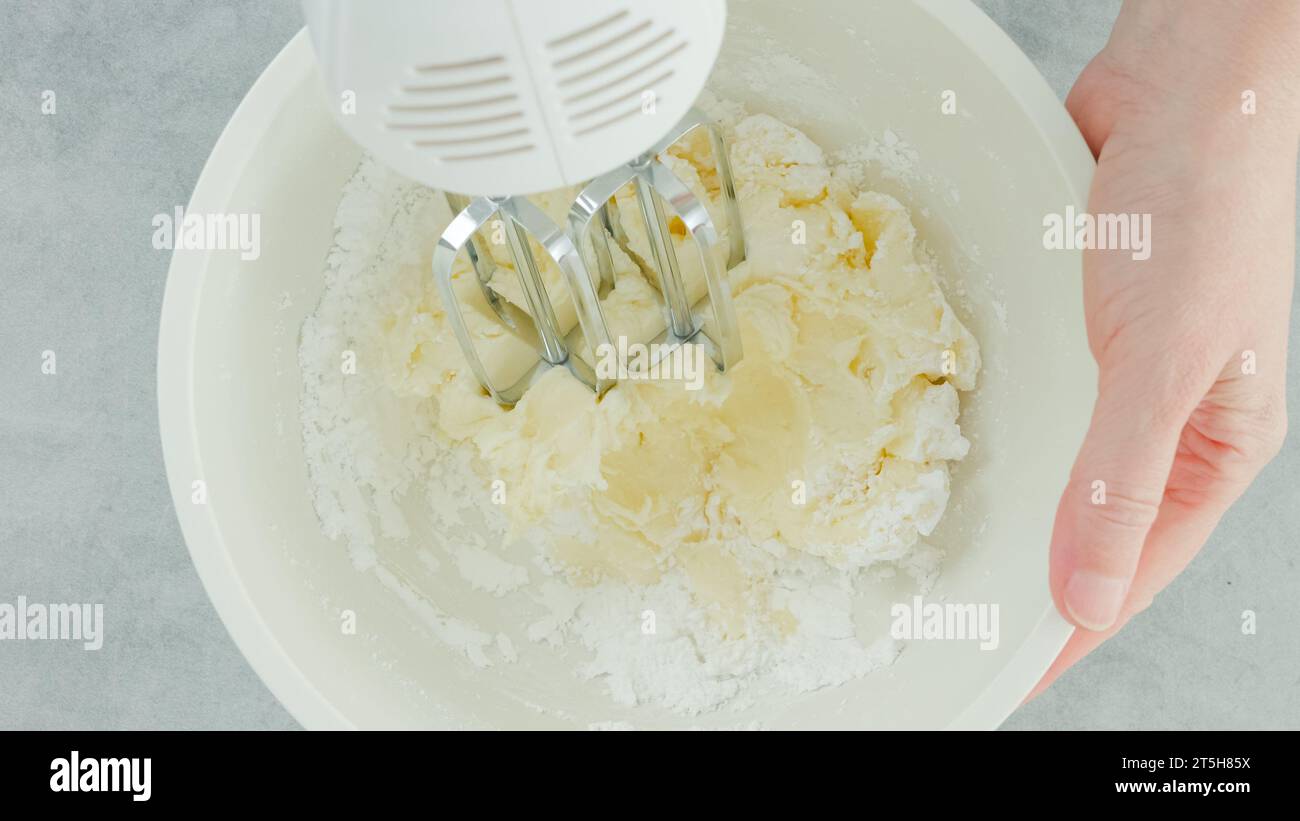 Cream cheese whipped cream recipe. Mixing cream cheese, sugar powder