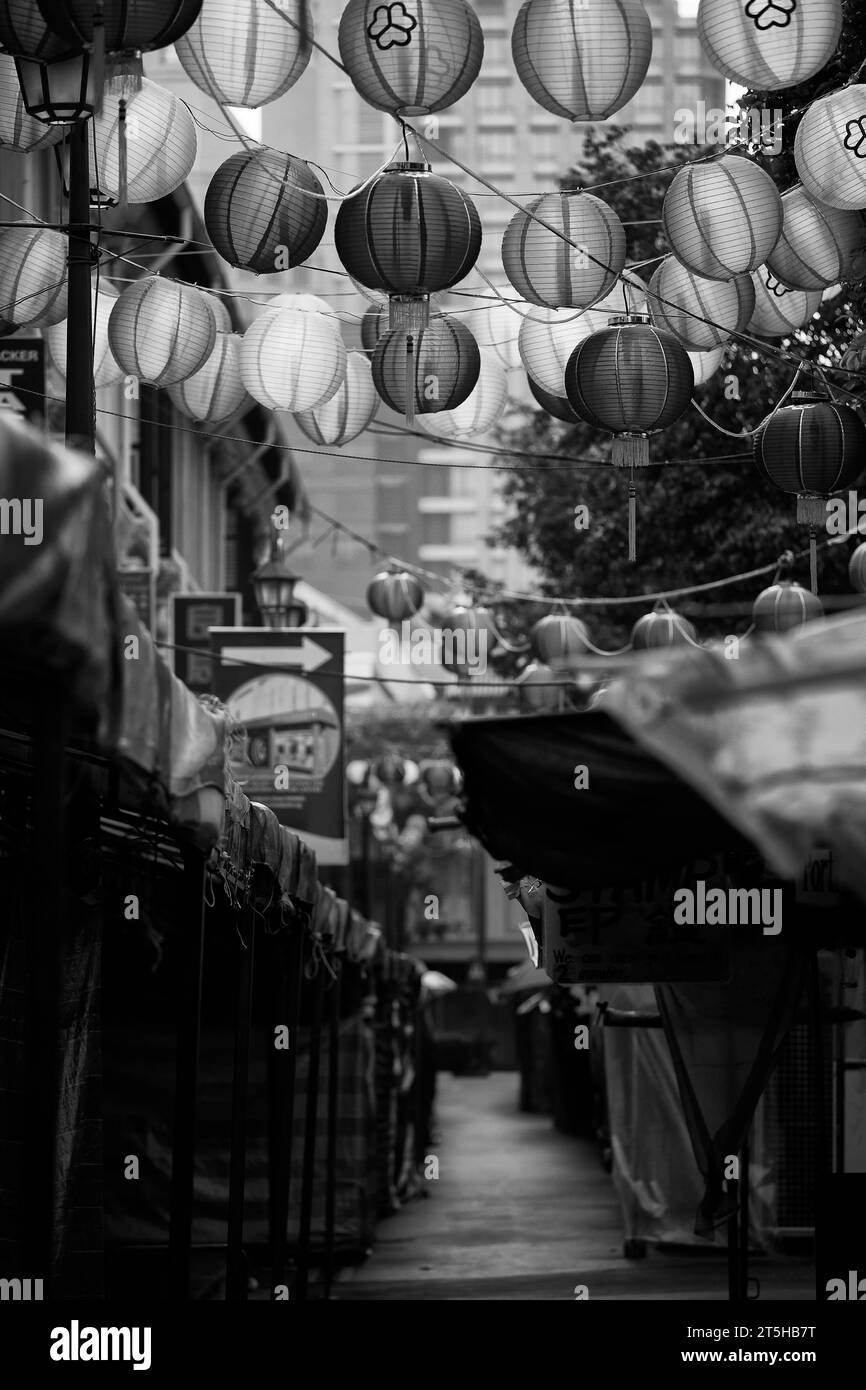 Black And White Photo Of Ornate Paper Chinese Hanging Lanterns Celebrating The Mid-Autumn Festival In Chinatown, Singapore. Stock Photo