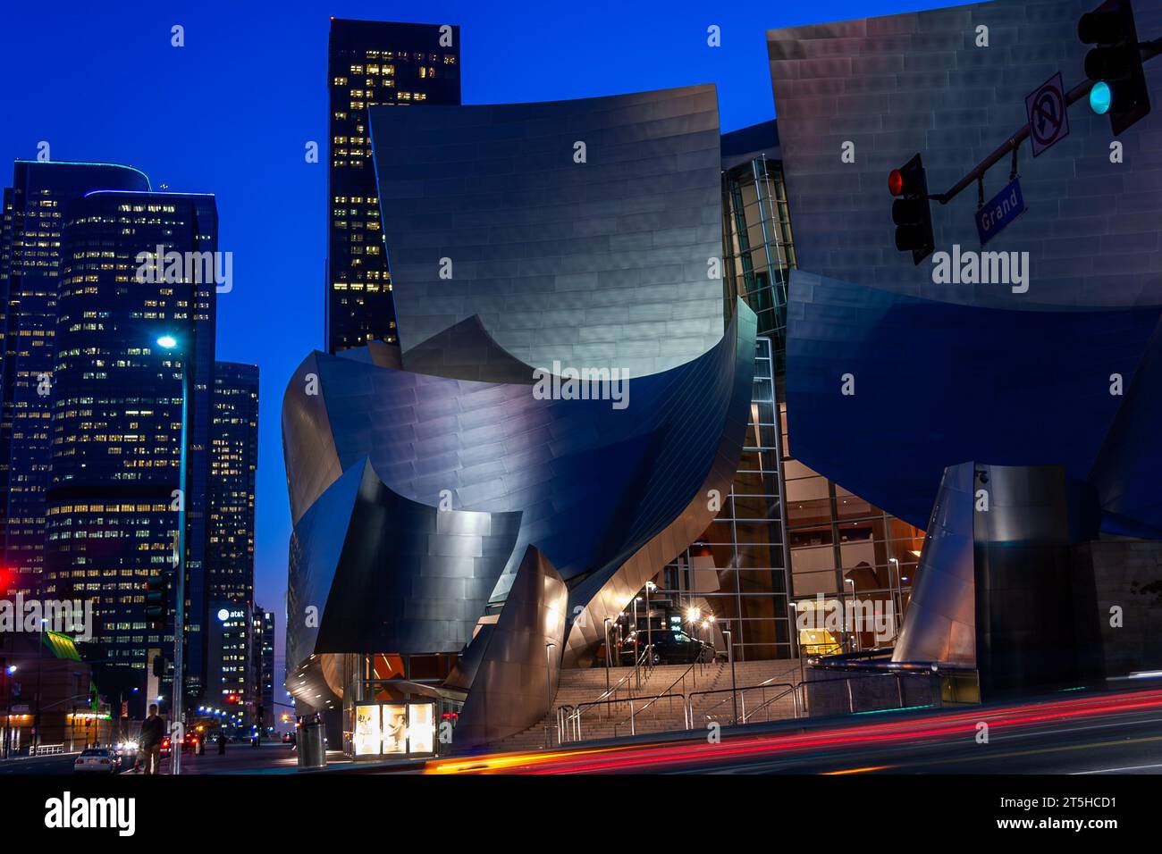 Light begins to play off the metallic curves of Frank Gehry's Walt Disney Concert Hall in downtown Los Angeles, California, USA. Stock Photo