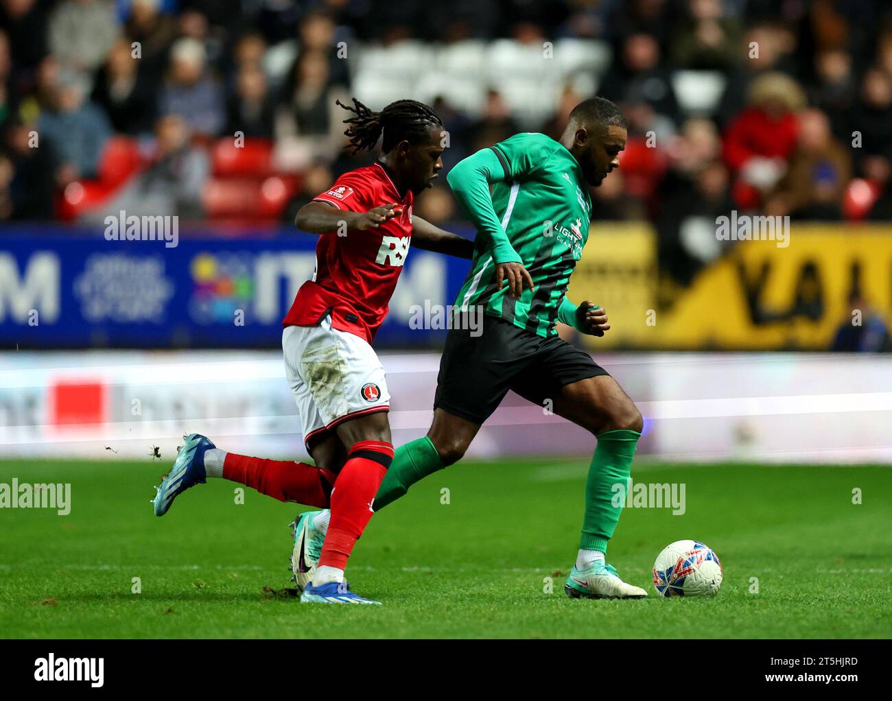 Charlton Athletic's Karoy Anderson (left) and Cray Valley's Sonny Black battle for the ball during the Emirates FA Cup first round match at The Valley, London. Picture date: Sunday November 5, 2023. Stock Photo