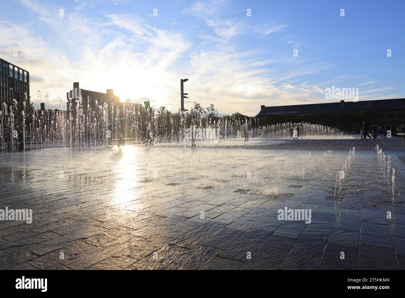 Autumn sunshine on the fountains in Granary Square, at Kings Cross