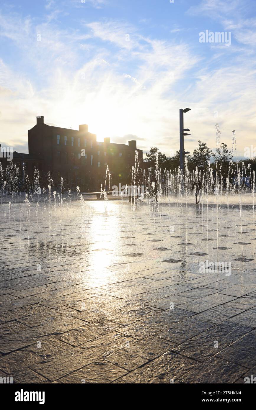 Autumn sunshine on the fountains in Granary Square, at Kings Cross