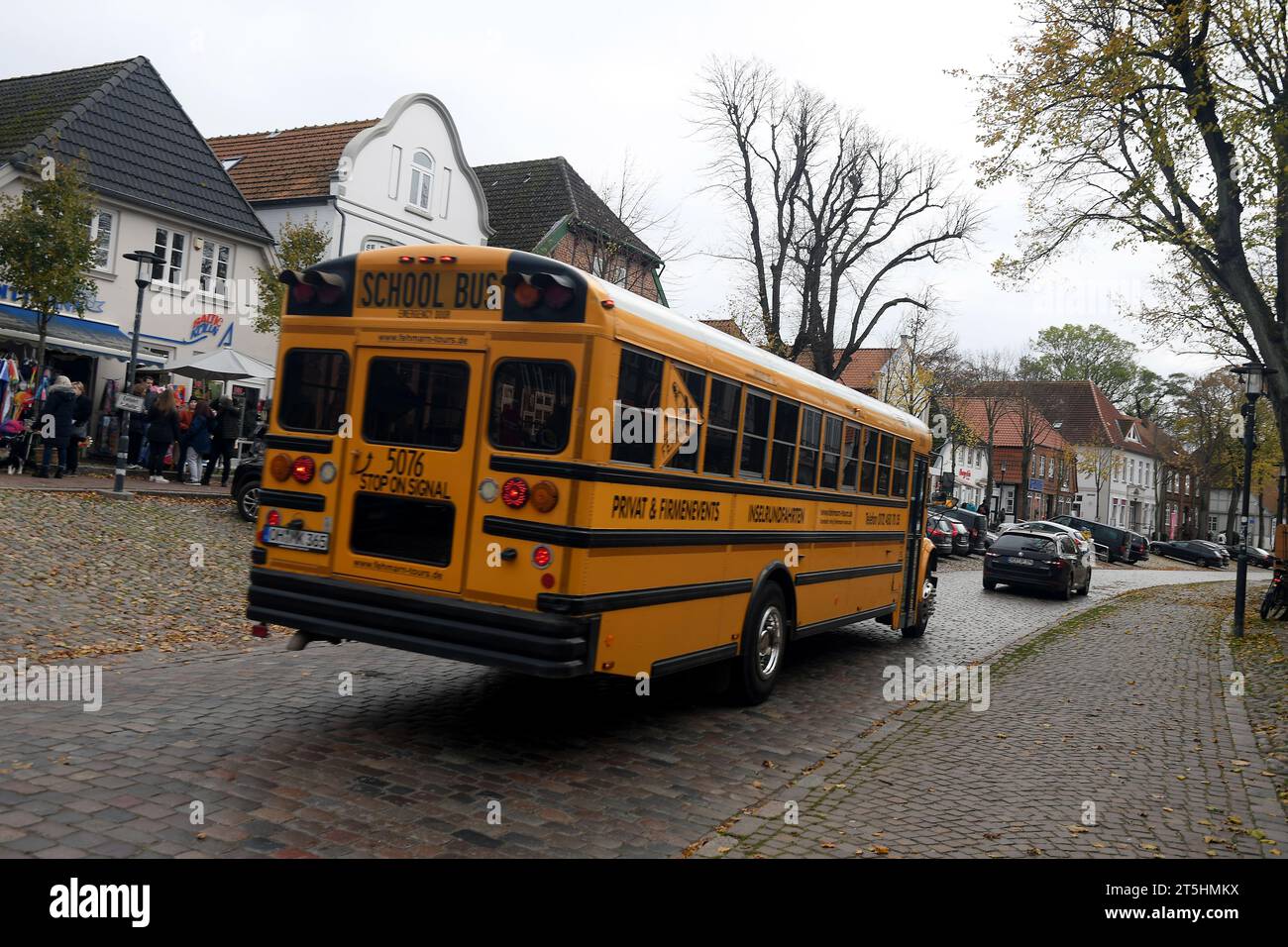 burger-fehmarn-germany-04-november-2023-yellow-school-bus-in-german