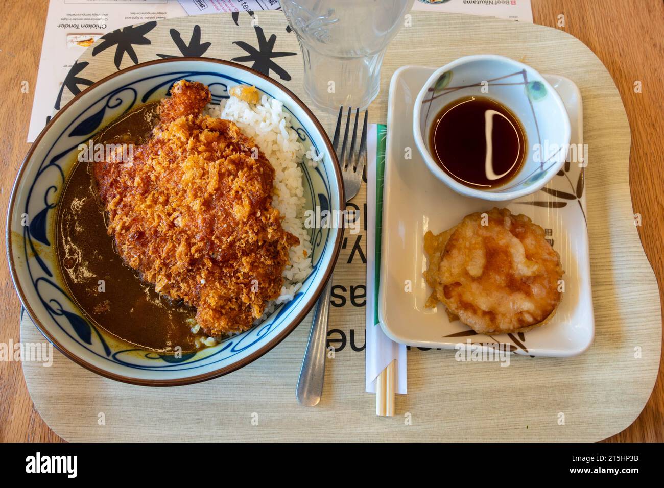 Close up view of a bowl of Japanese chicken katsu curry served with