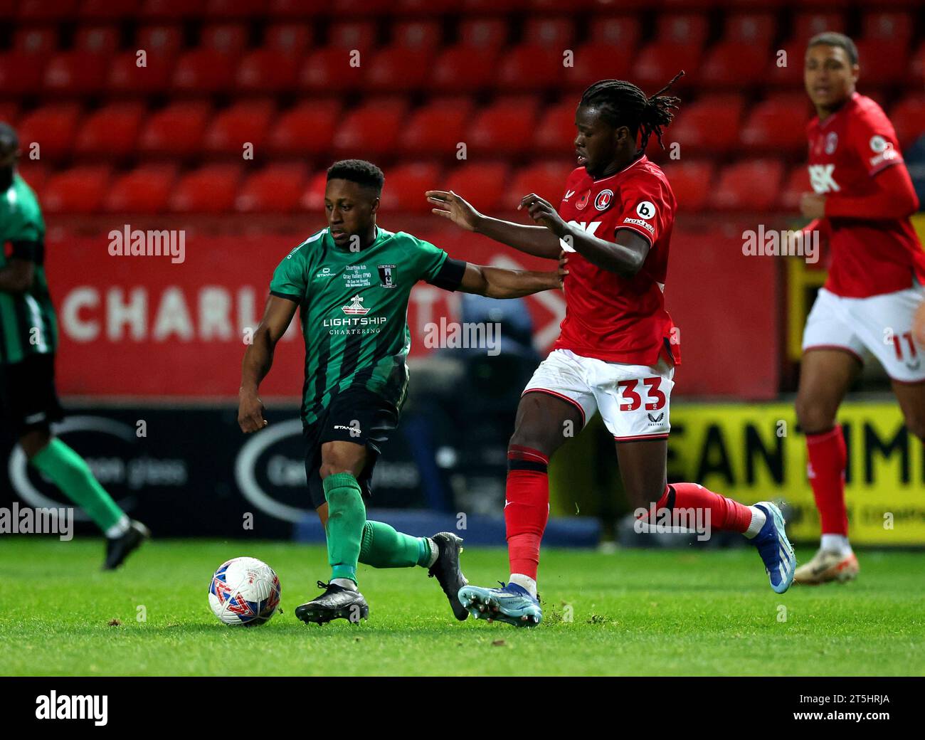 Charlton Athletic's Karoy Anderson (right) and Cray Valley's Michael Ademiluyi battle for the ball during the Emirates FA Cup first round match at The Valley, London. Picture date: Sunday November 5, 2023. Stock Photo