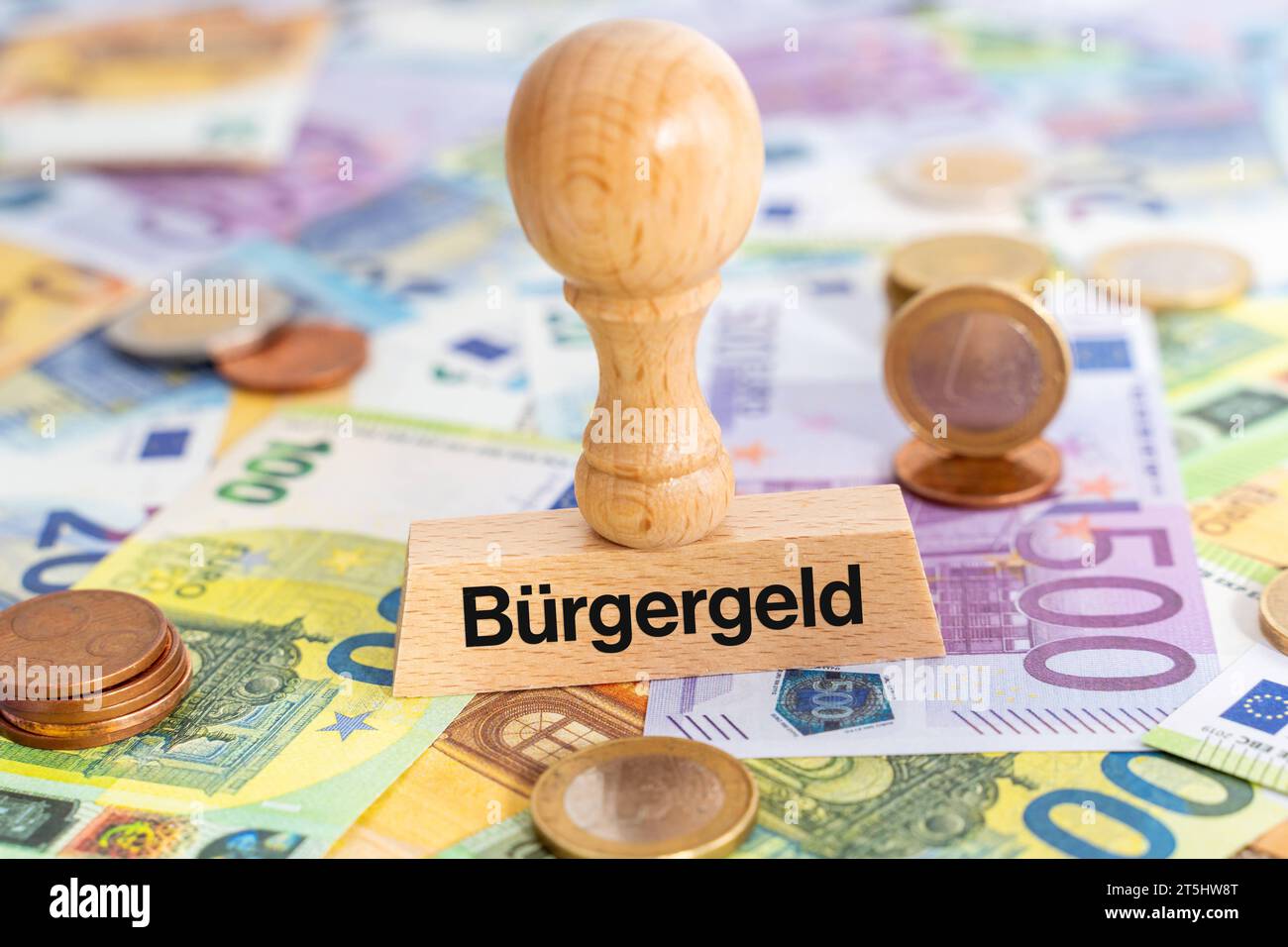 4 November 2023: Stempel auf Euro Geldscheinen mit der Aufschrift Bürgergeld FOTOMONTAGE *** Stamp on euro banknotes with the inscription Bürgergeld FOTOMONTAGE Credit: Imago/Alamy Live News Stock Photo