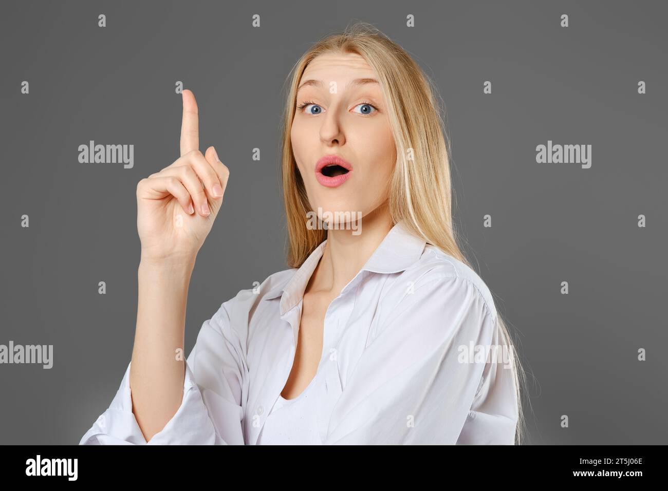 Woman points finger open mouth hi-res stock photography and images - Alamy