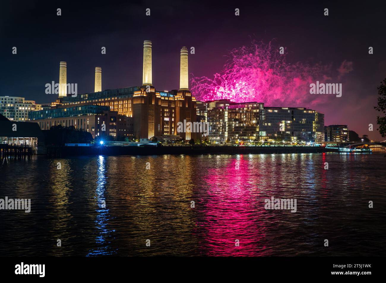 Battersea Park fireworks over Battersea Power Station, reflected int he River Thames, November 2023 Stock Photo