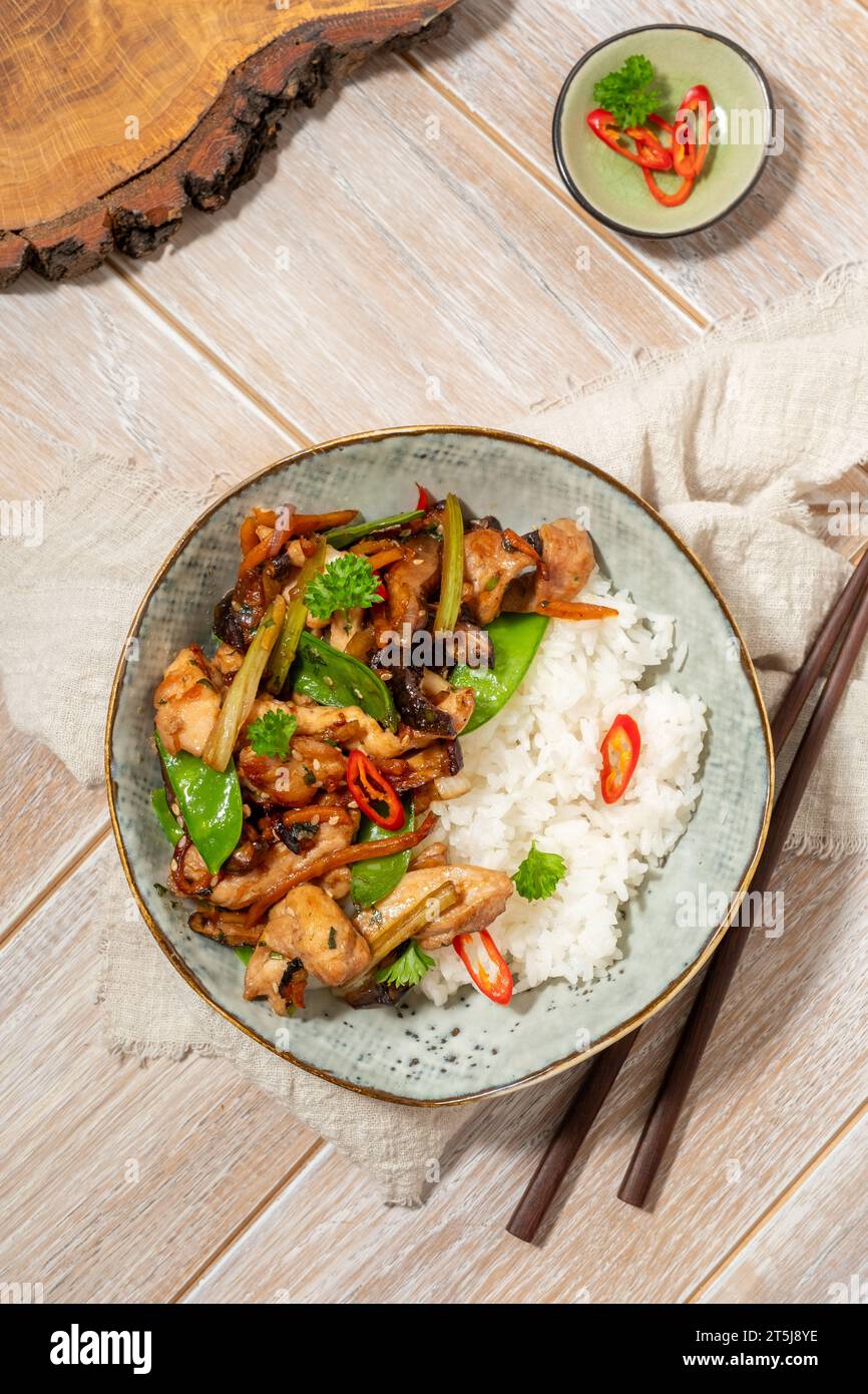 Homemade sesame Chicken served with Jasmine white rice, selective focus Stock Photo