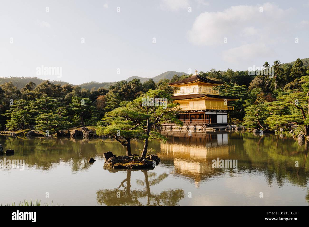 Kinkaku-ji temple with gold-leaf facade in front of a reflective pond. Kyoto, Japan. Stock Photo