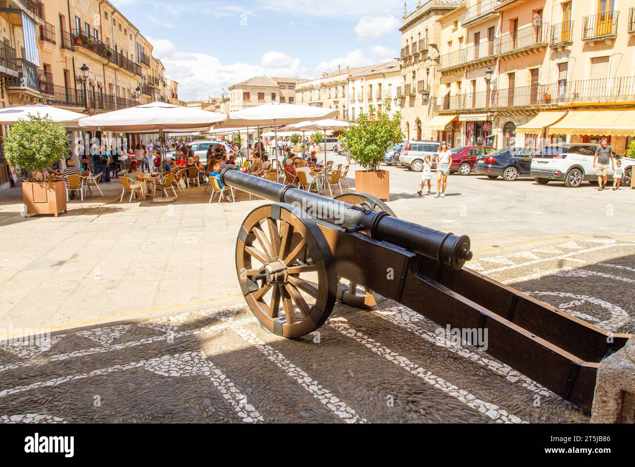 People enjoying the summer sunshine eating and drinking in the Plaza