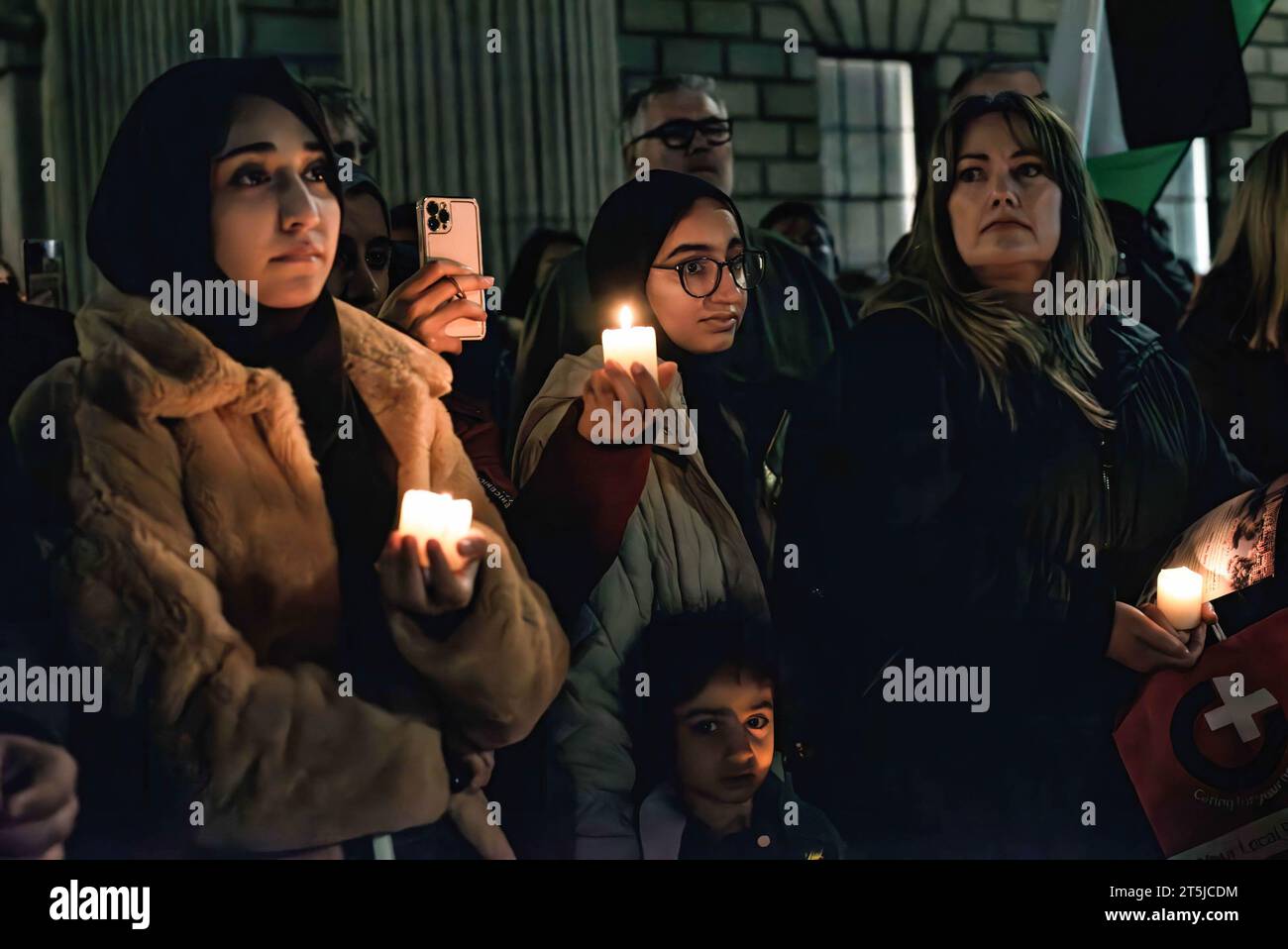 Dublin, Ireland. 3rd Nov, 2023. A group of women hold candles during