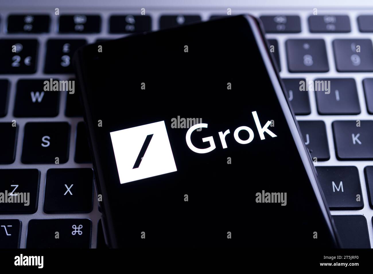Grok AI chatbot logo seen on smartphone screen. Grok X.ai is a new Chatbot for x platform (ex Twitter). Stafford, United Kingdom, November 5, 2023 Stock Photo