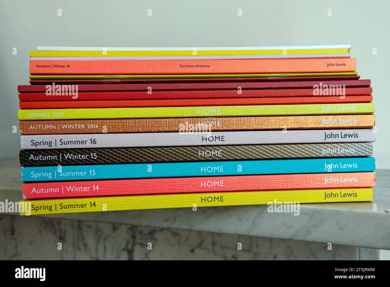 Pile of John Lewis Catalogues on mantelpiece Stock Photo Alamy