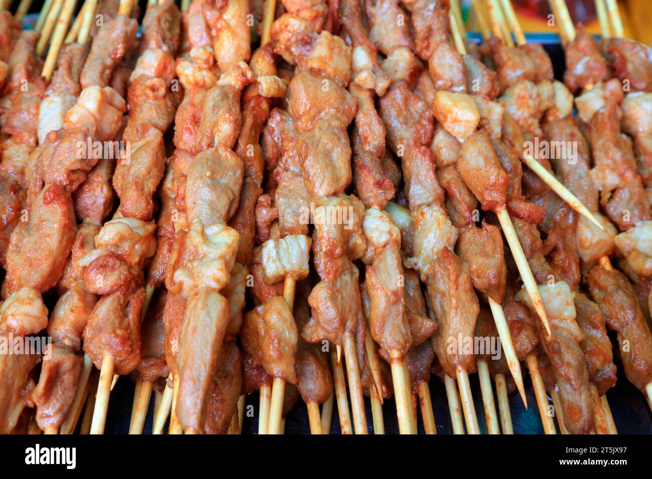 Chinese snacks meat string Stock Photo - Alamy
