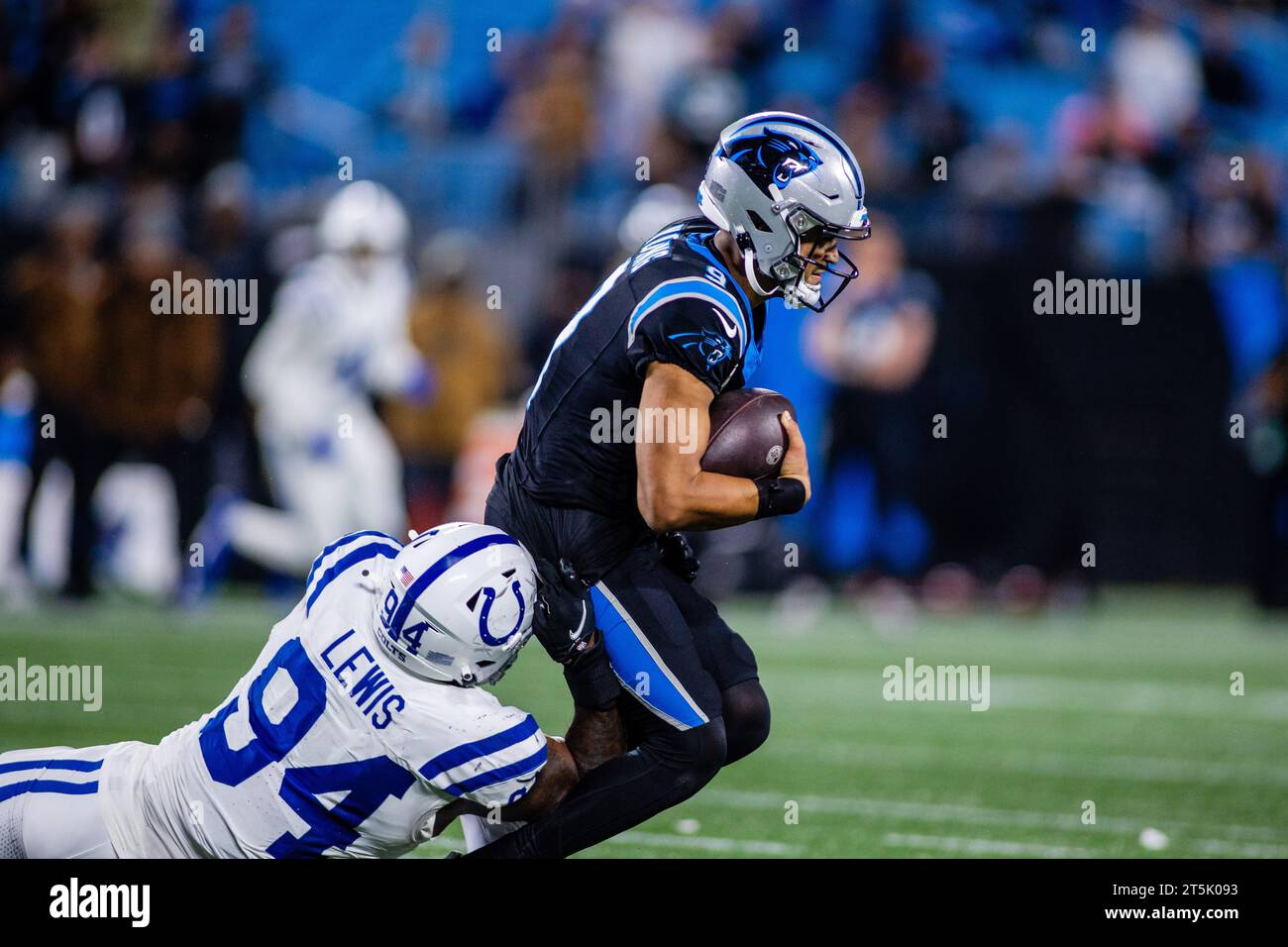 Charlotte, NC, USA. 5th Nov, 2023. Indianapolis Colts defensive end Tyquan Lewis (94) tackles Carolina Panthers quarterback Bryce Young (9) during the fourth quarter of the NFL matchup in Charlotte, NC. (Scott Kinser/Cal Sport Media). Credit: csm/Alamy Live News Stock Photo