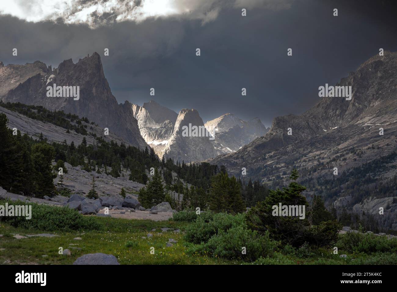 WY05636-05...WYOMING - Storm coming over Sundance Pinnacle towards Deep Lake in the Bridger Wilderness of the Wind River Range. Stock Photo