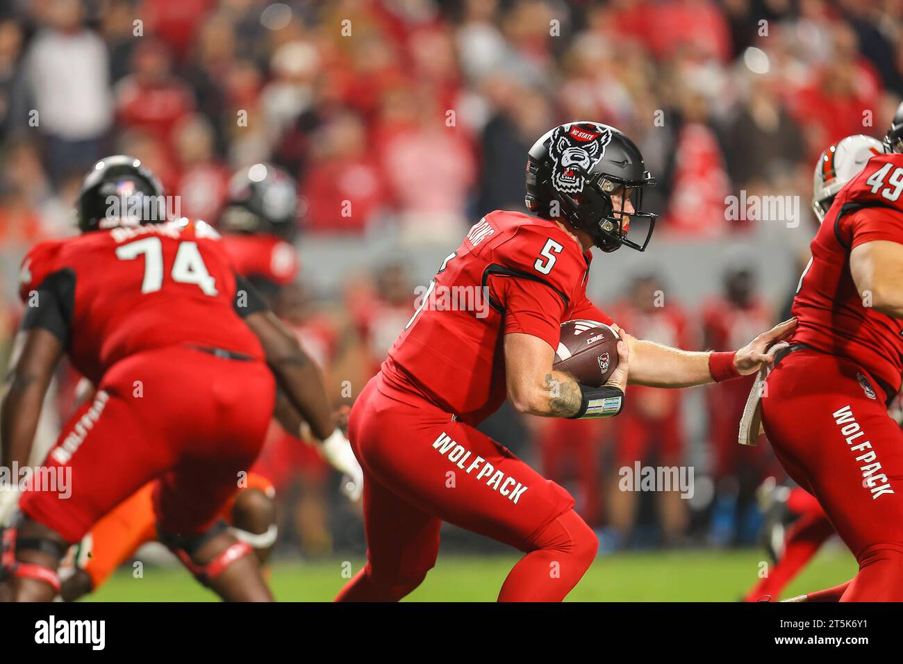 November 4, 2023 NC State senior Brennan Armstrong (5) runs the ball against Miami. NCAA