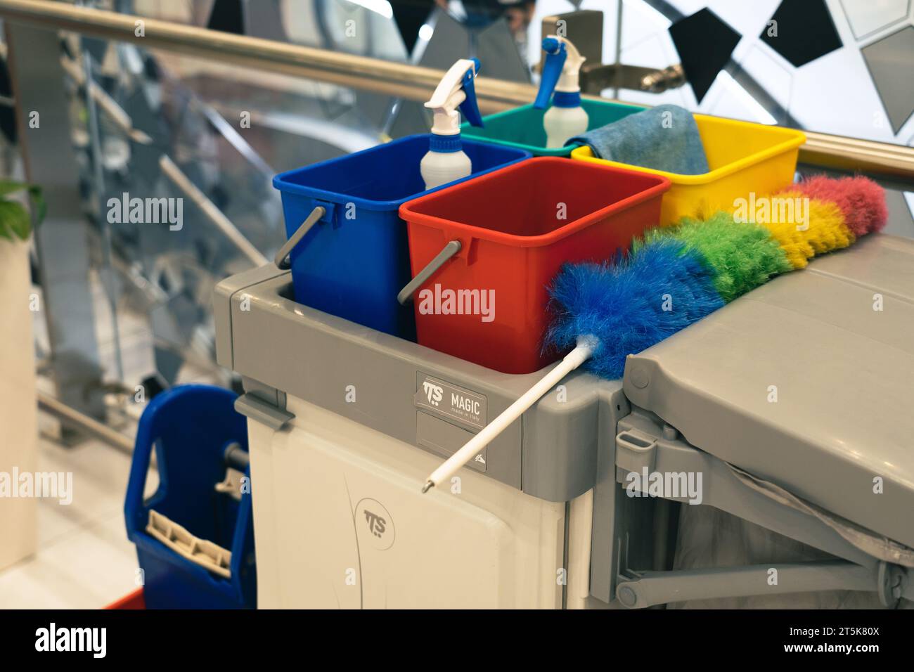 Warning sign slippery with Cleaning Cart Stock Photo - Alamy