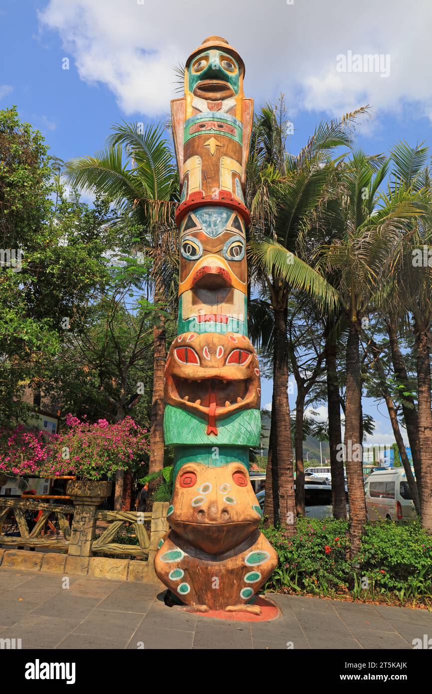 Wood totem poles in a park, China Stock Photo - Alamy