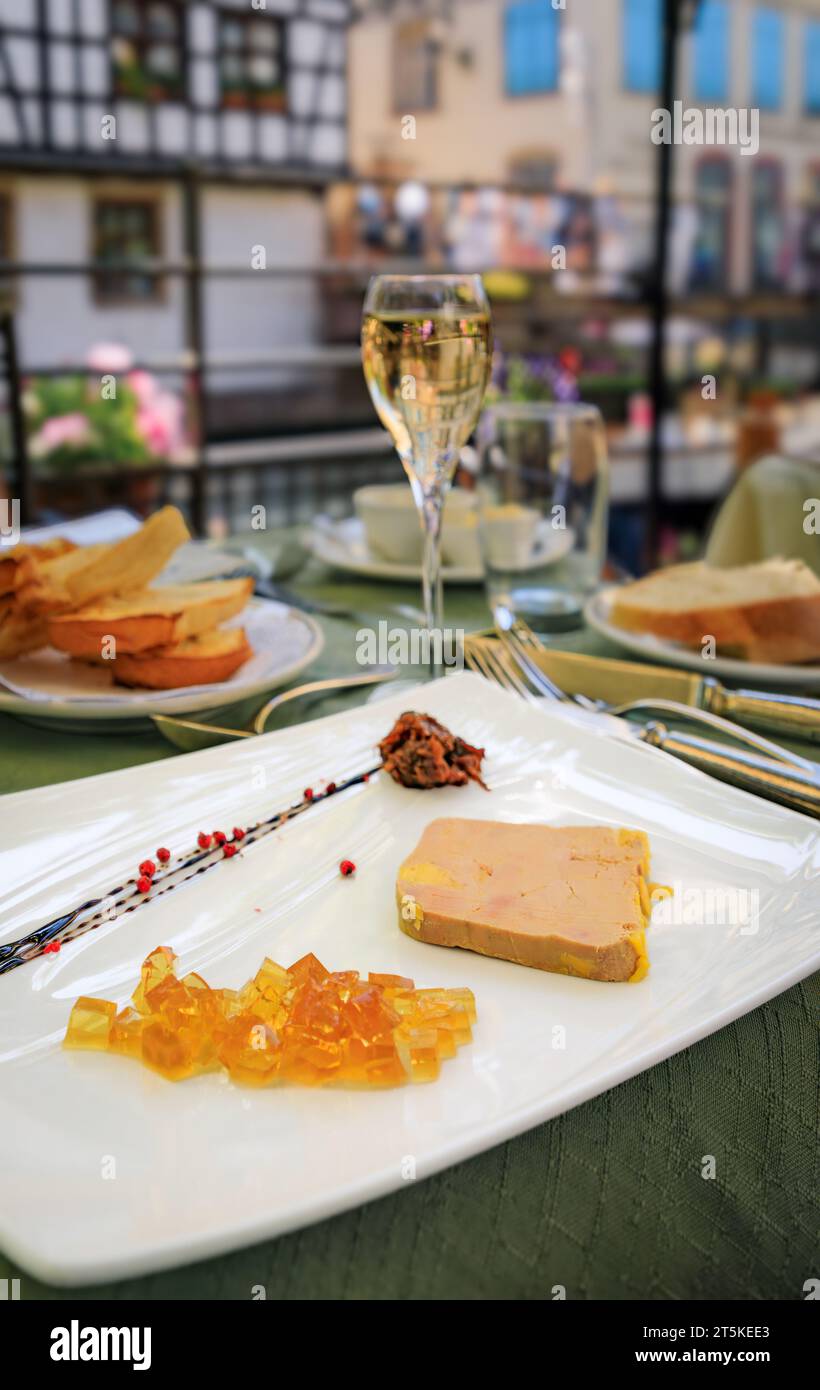 Traditional French mi cuit foie gras duck liver pate with white wine jelly and caramelized