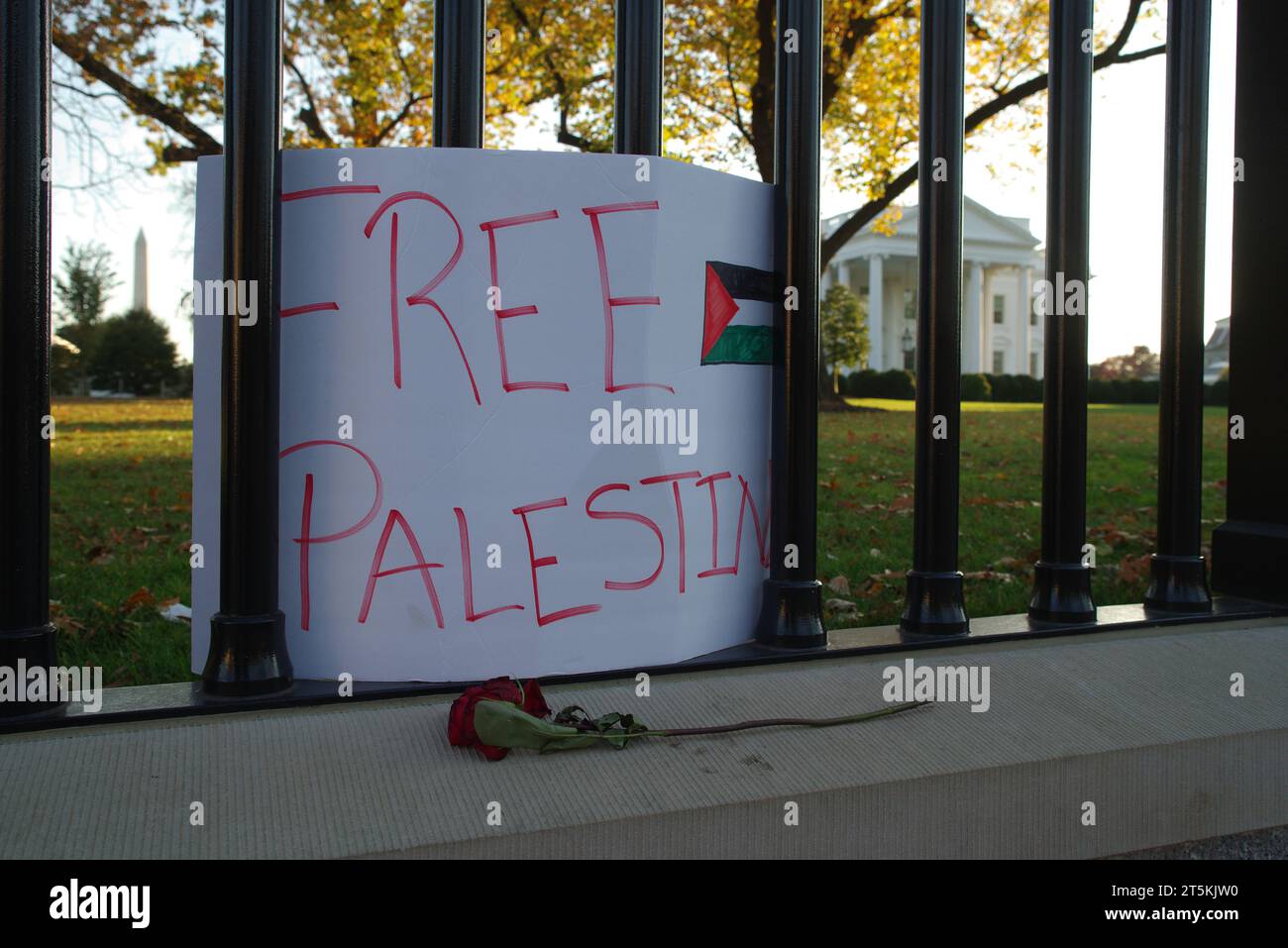 A "Free Palestine" protest sign remains on the White House fence the day after pro-Palestinian protests in Washington, DC. Stock Photo