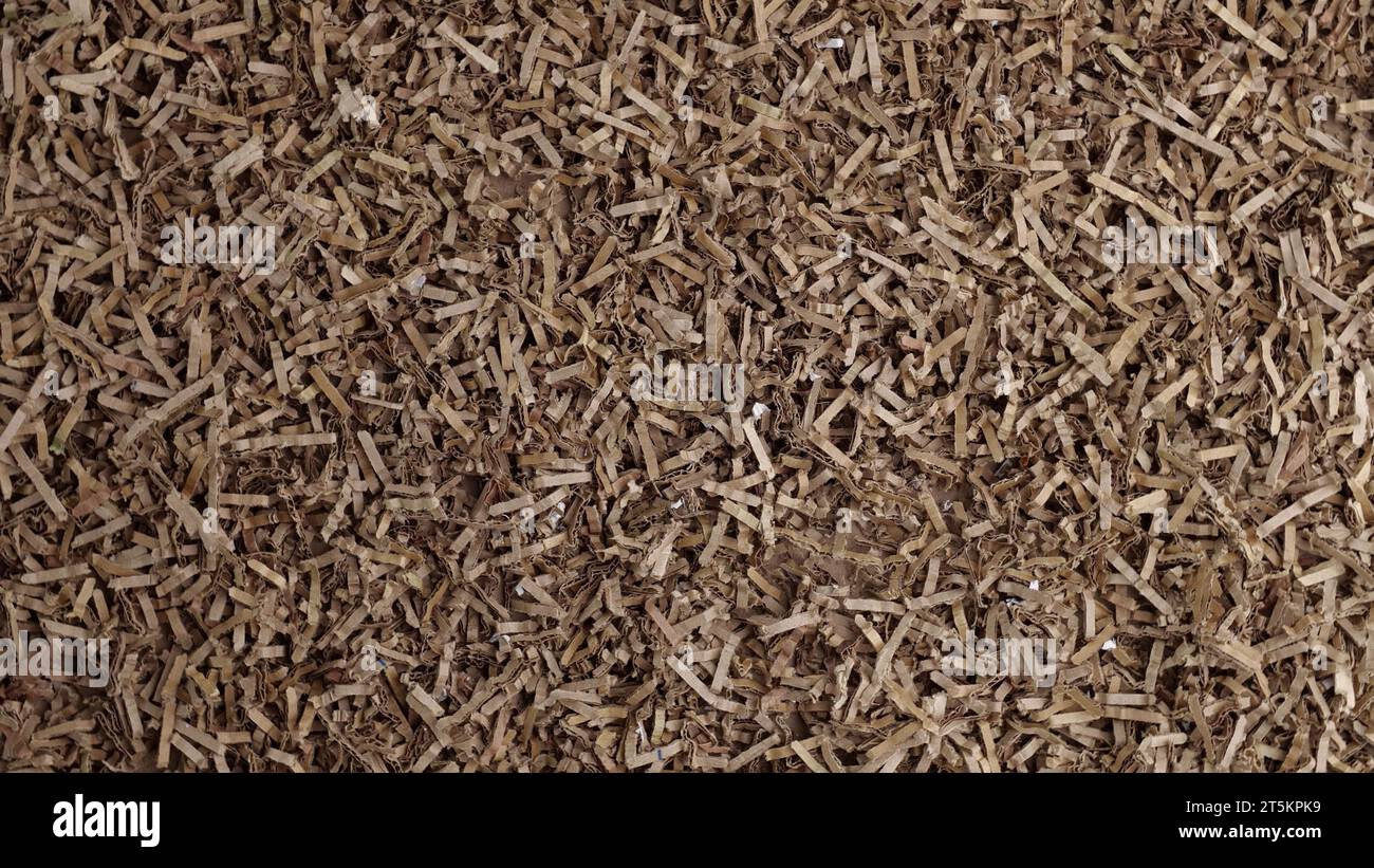Shredded cardboard material for gift baskets, mulch, compost, worm bin. Cardboard shreds