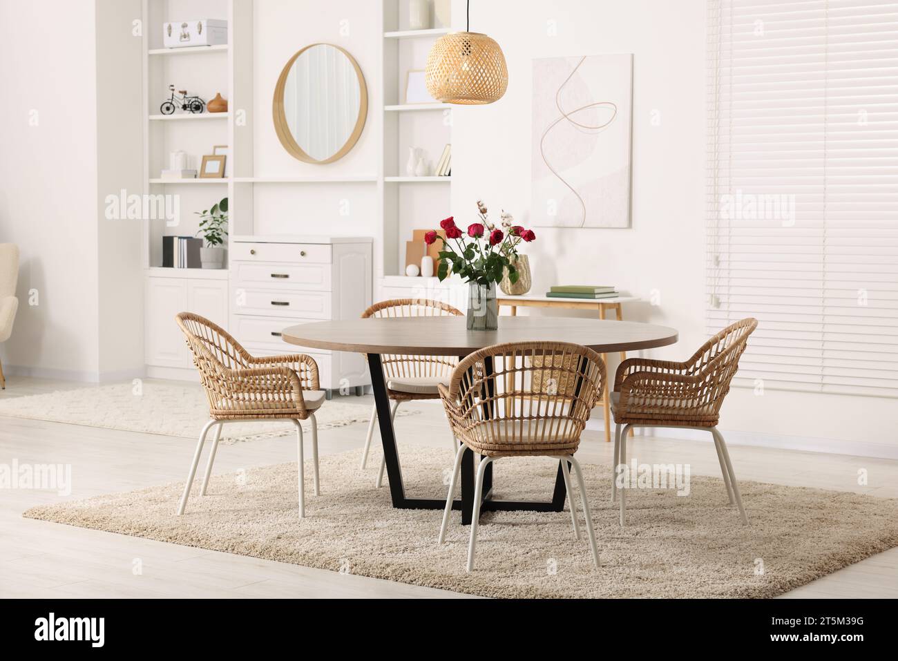 Stylish dining room interior with table and chairs Stock Photo - Alamy