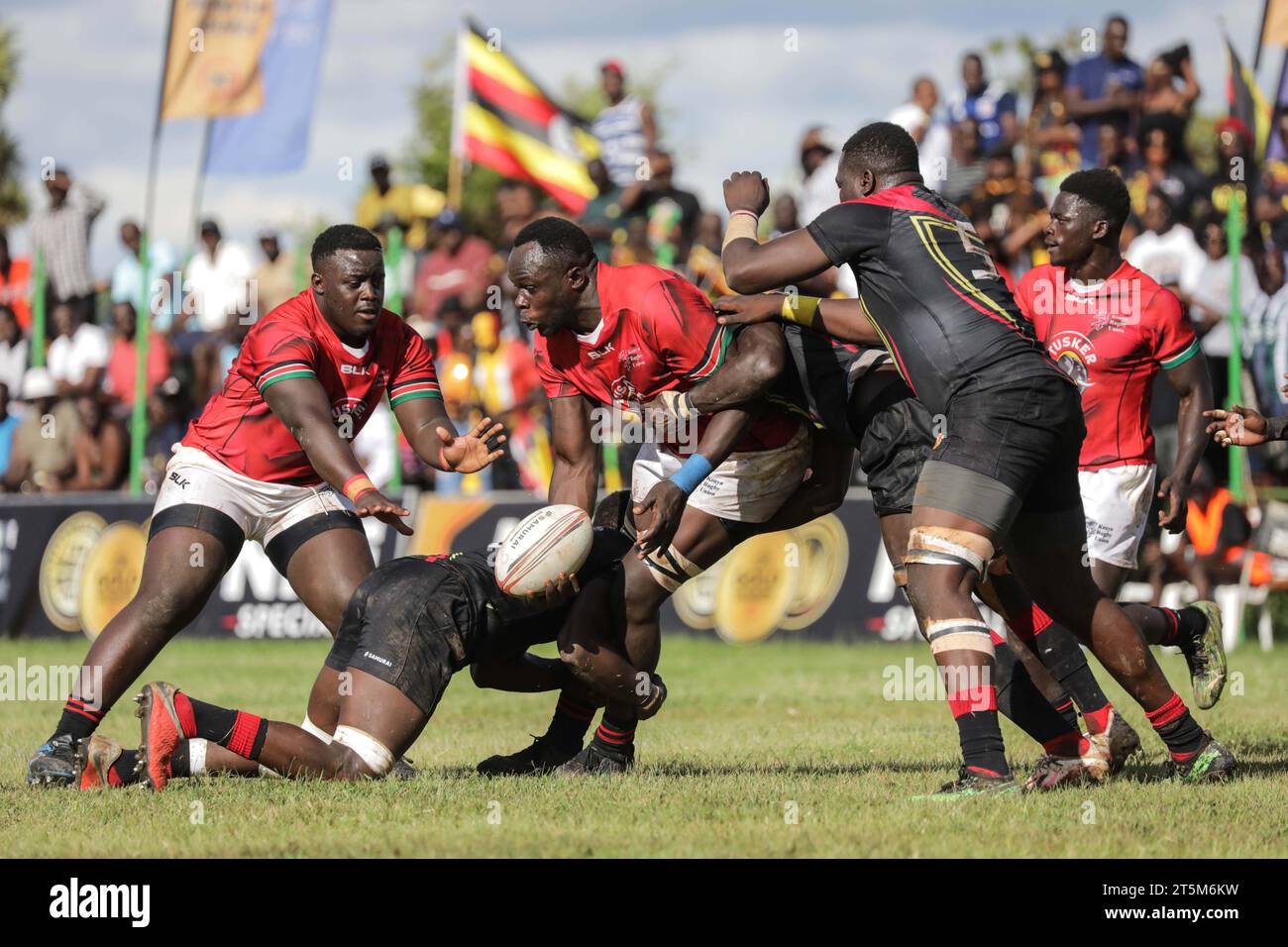 Kampala, Uganda. 5th Nov, 2023. Players (black) of Uganda compete with players of Kenya during their match in the Victoria Rugby Cup final at Kings Park Arena in Kampala, capital of Uganda, on Nov. 5, 2023. TO GO WITH 'Uganda beat arch-rivals Kenya to win Victoria Rugby Cup' Credit: Hajarah Nalwadda/Xinhua/Alamy Live News Stock Photo
